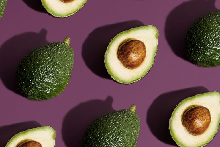 Avocados arranged in rows