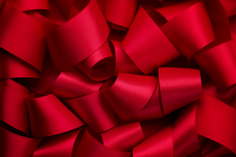 a bunch of red ribbon