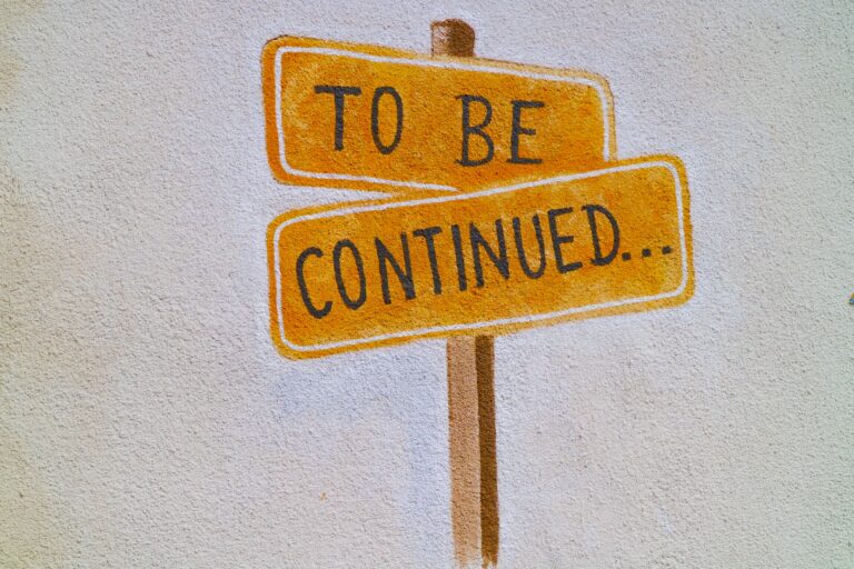 a painting of a street sign that shows "to be continued"