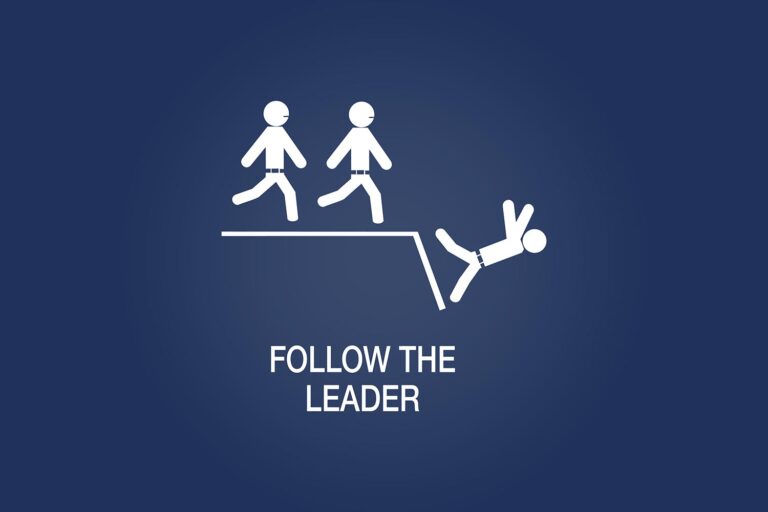 a stick figure falls off a cliff as two other stick figures are about to. Text reads: Follow the leader