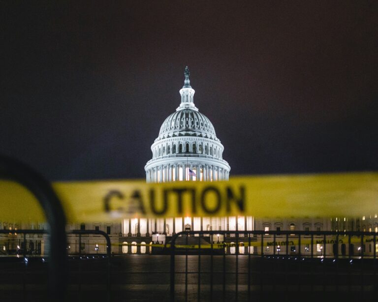 the united states capitol building with caution tape in front