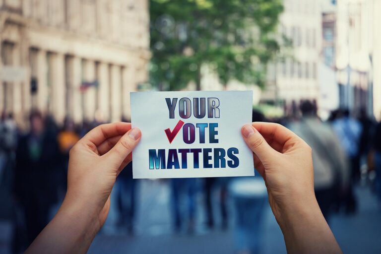 A sign being held up that says Your Vote Matters