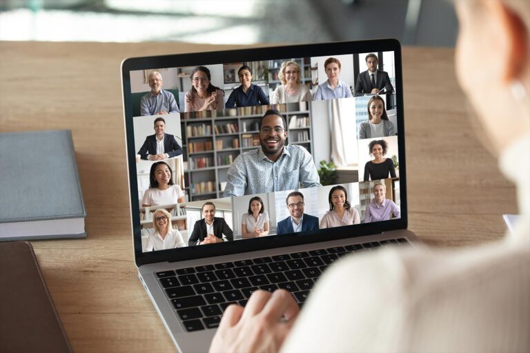 An online meeting on a laptop