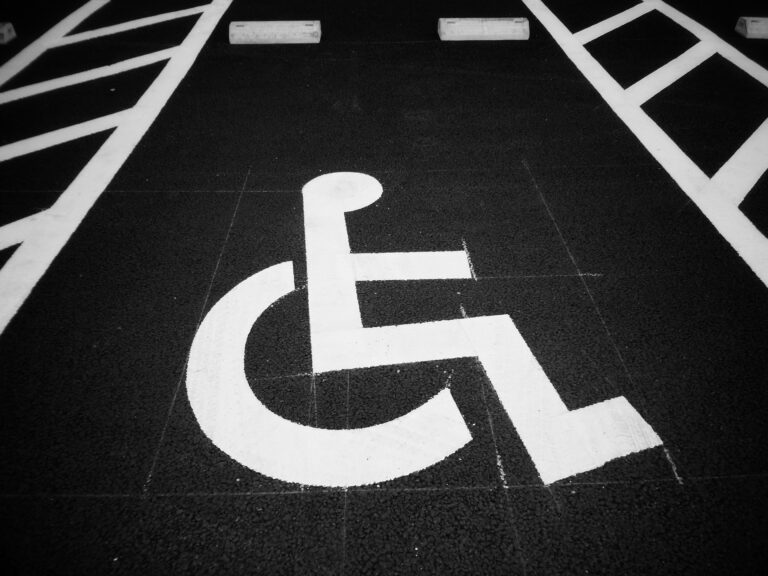 a painted handicap symbol on a parking space