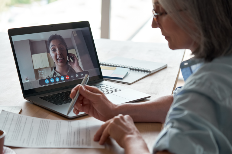 woman having an online meeting on a laptop