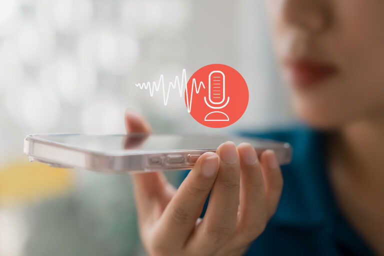 close-up photo of a woman recording a conversation on a smart phone