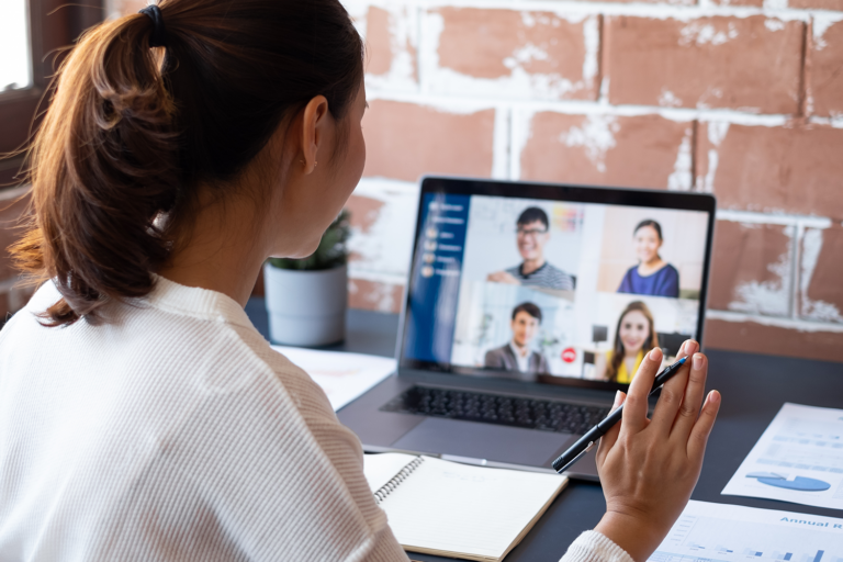 Woman on a laptop at an online meeting