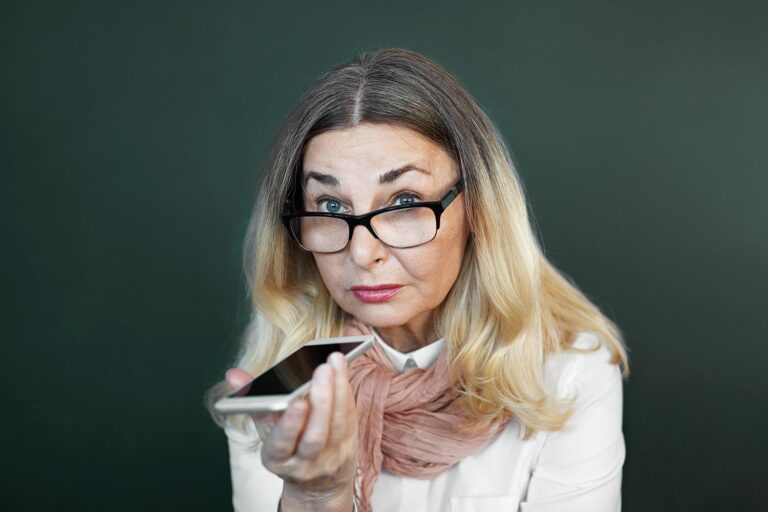 a woman holding a cell phone