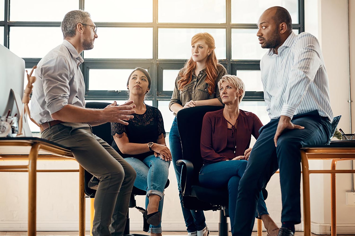 a group of people in an office